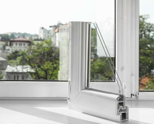 Sample-of-modern-double-pane-window-profile-in-front-of-window